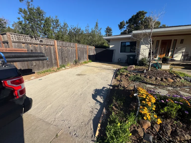 Finished parking pad at a single family residence